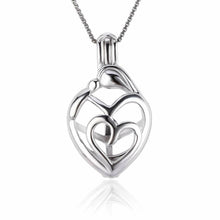 Load image into Gallery viewer, Mother and Child Sterling Silver Cage Pendant