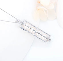 Load image into Gallery viewer, Cylinder Sterling Silver Cage Pendant
