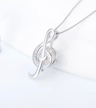 Load image into Gallery viewer, Treble Clef Sterling Silver Cage Pendant
